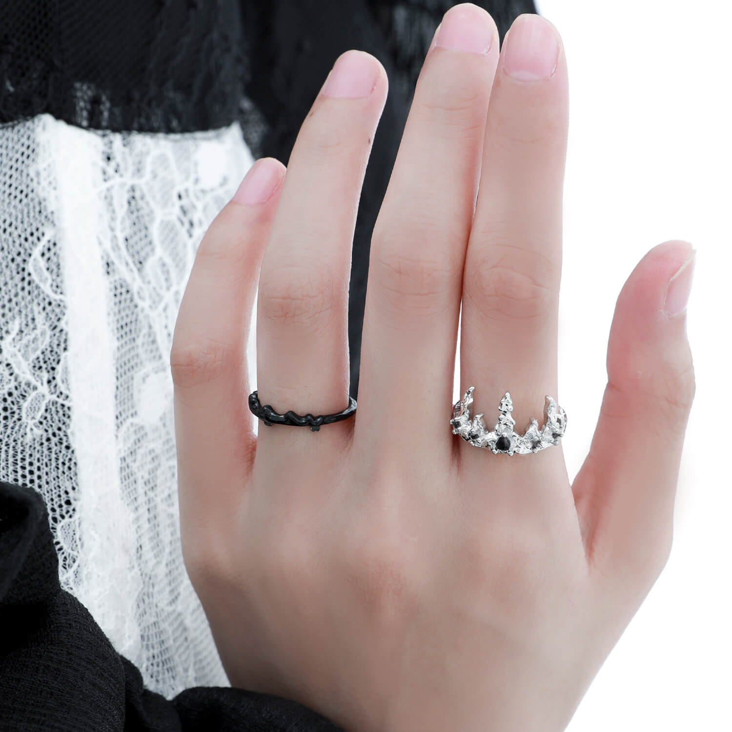 A chic crown design with a black zircon accent, offering flexible styling in silver and black. Find yours at KHANIE.COM.